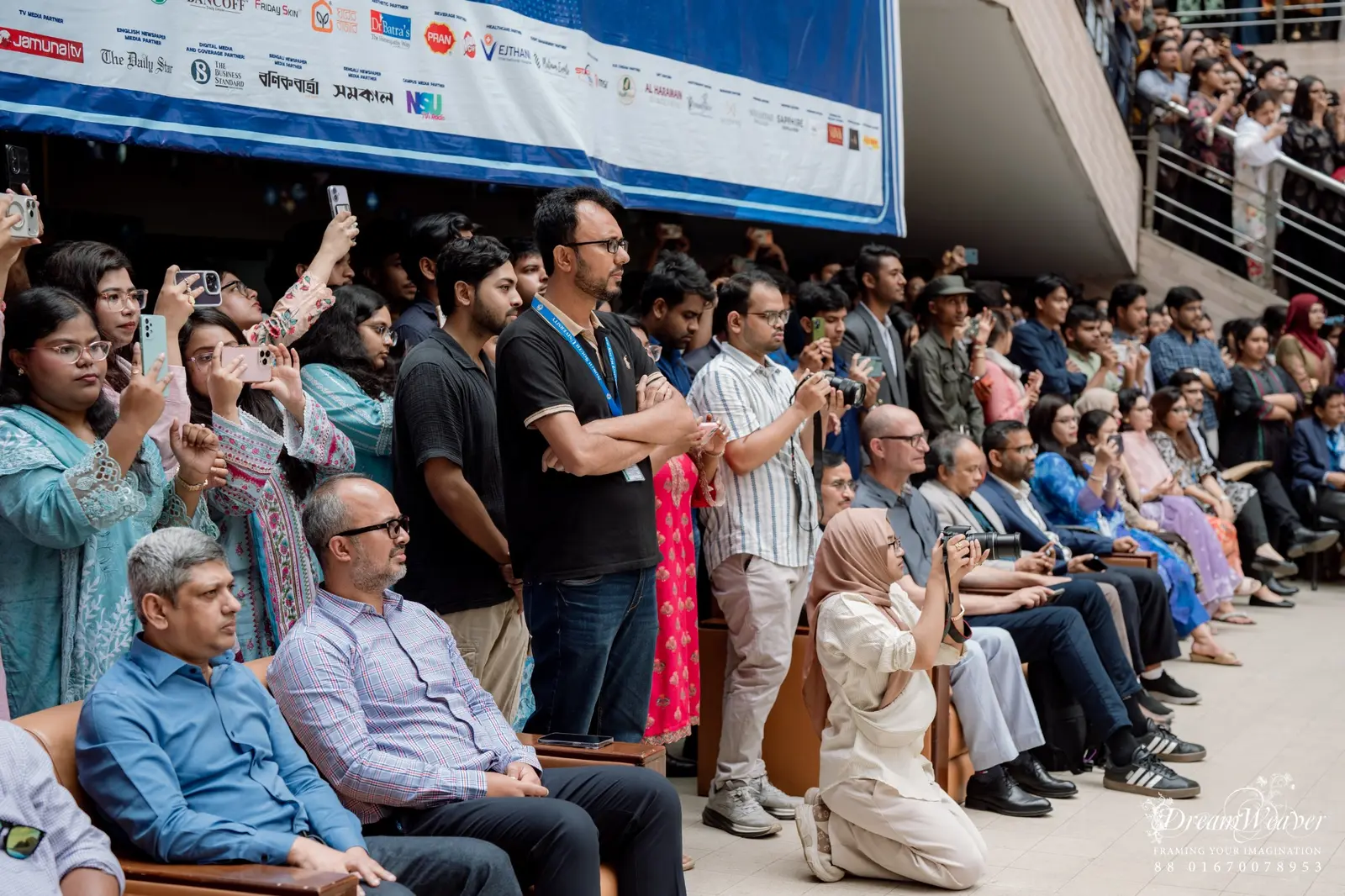 Faculty members and guests watching an NSUPC program